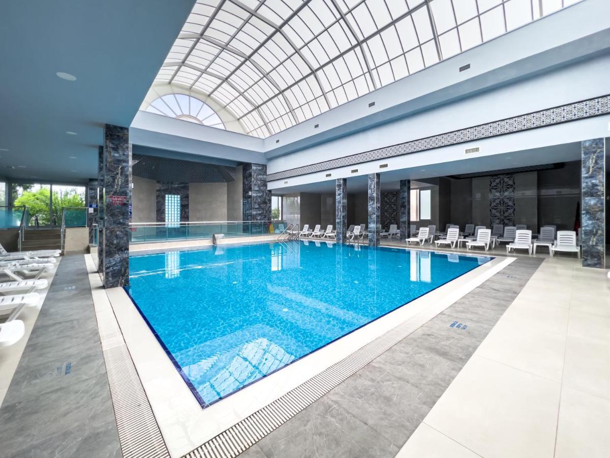 Spa Hotel Colossae Thermal Karahayit  Eksteriør billede Indoor pool