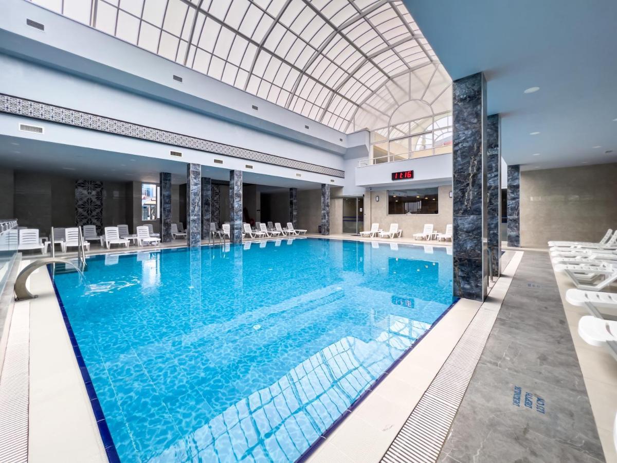Spa Hotel Colossae Thermal Karahayit  Eksteriør billede Indoor pool